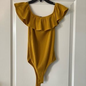 yellow bodysuit